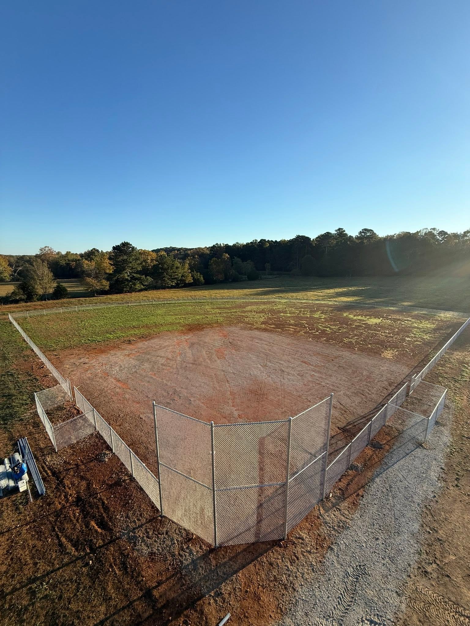 Sports field chain-link fence and backstop project in Northern Alabama