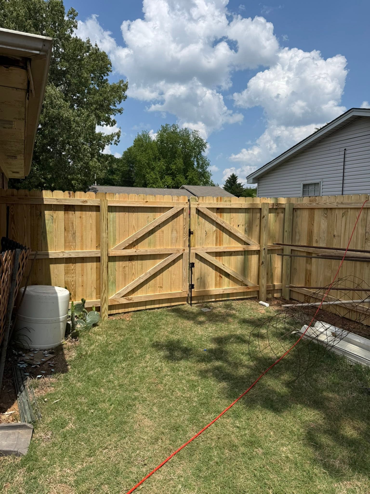 K-brace wood privacy double gate installation by Vaughn Fence in Northern Alabama